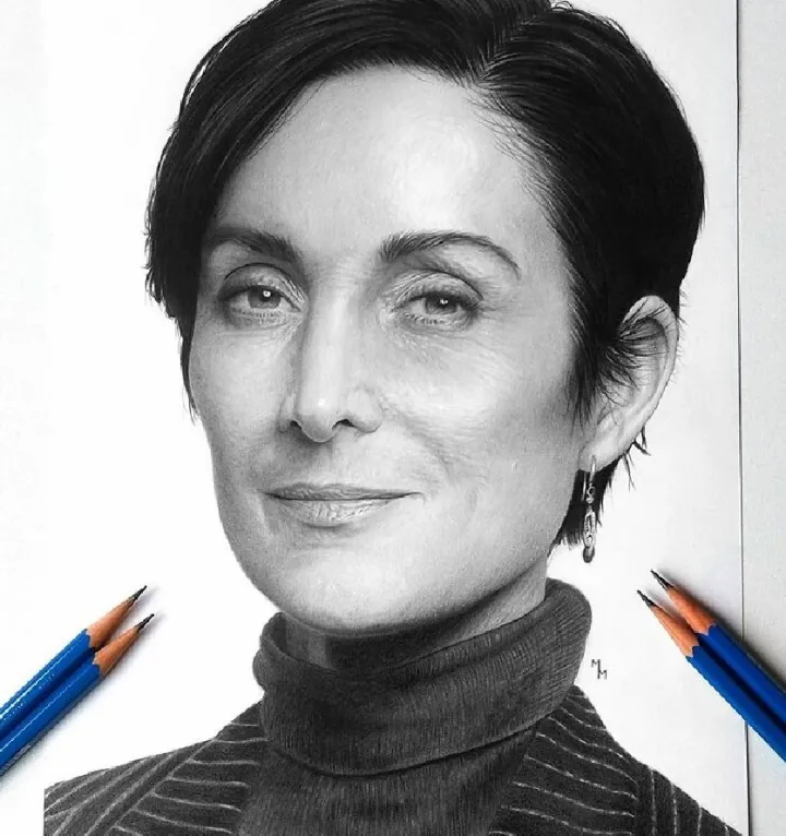 Кэрри-Энн Мосс.